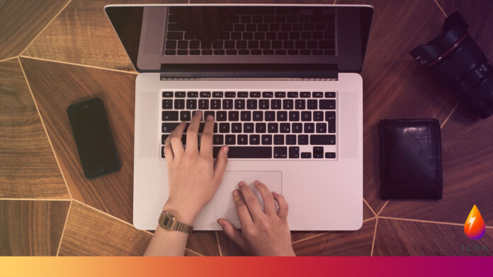 typing on laptop